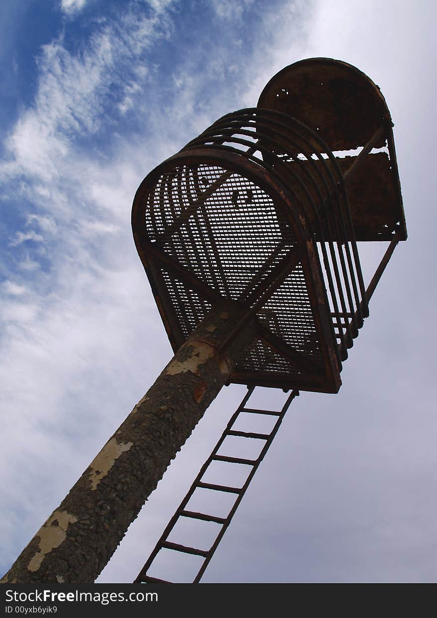 A run down lifeguard tower