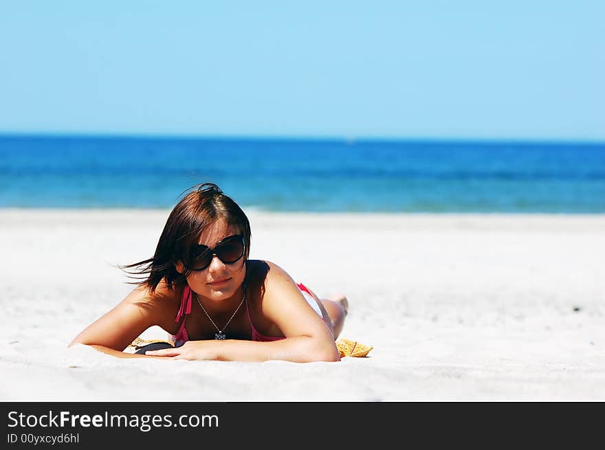 Beautiful Woman On The Beach