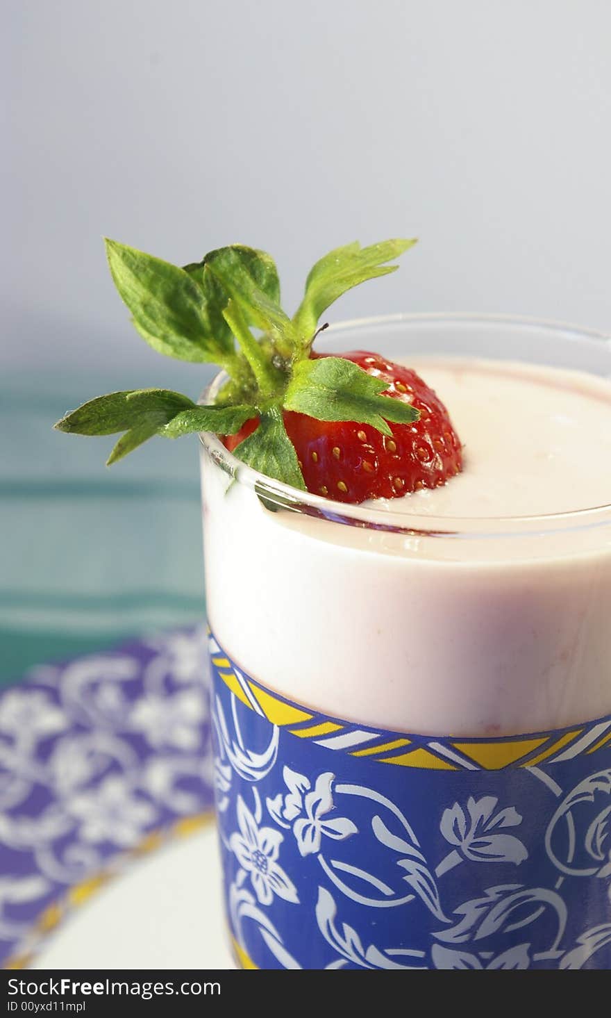 Glass of fresh yoghurt and ripe strawberry. Glass of fresh yoghurt and ripe strawberry