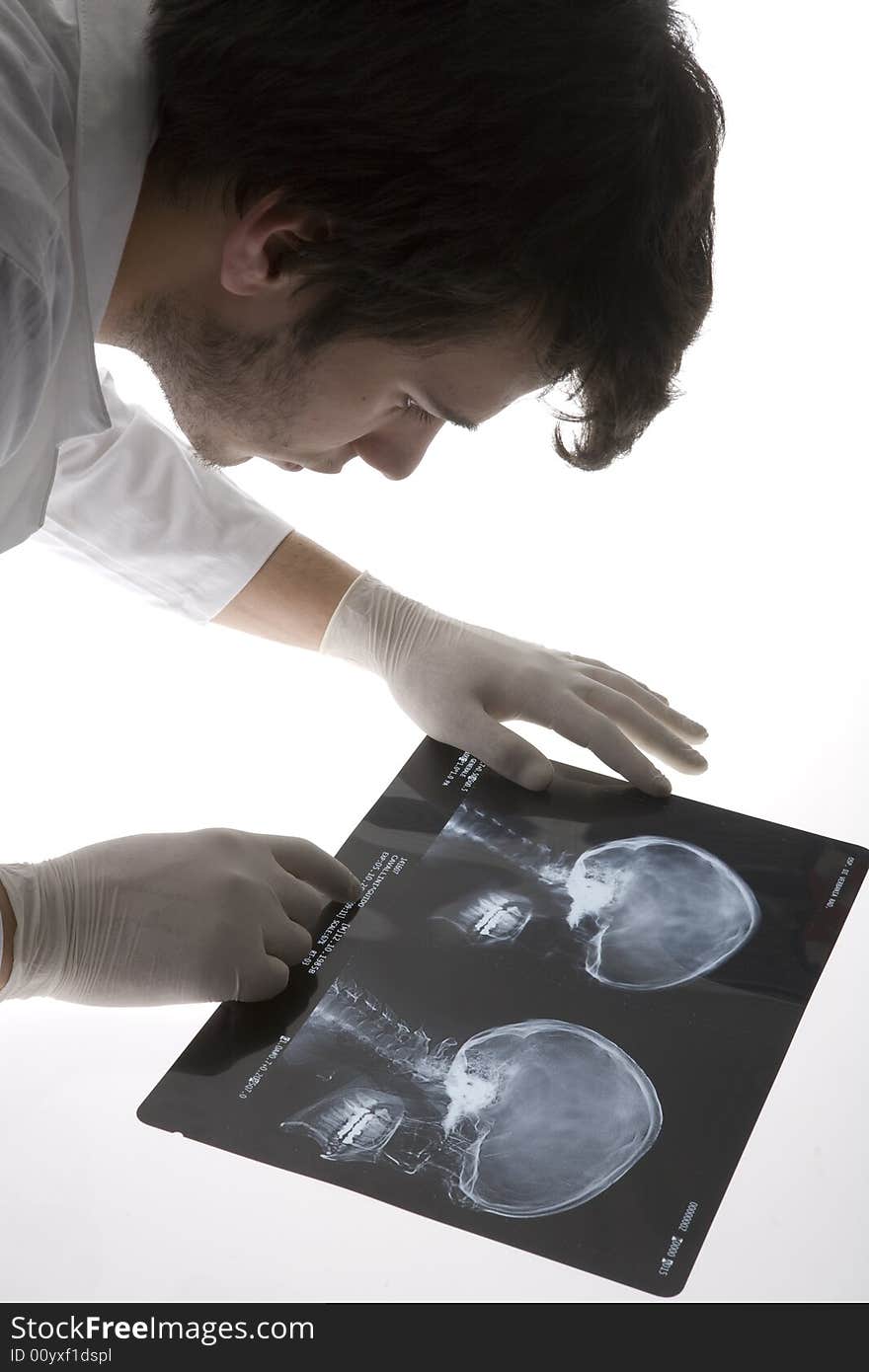 Young doctor who examines the X-rays. Young doctor who examines the X-rays