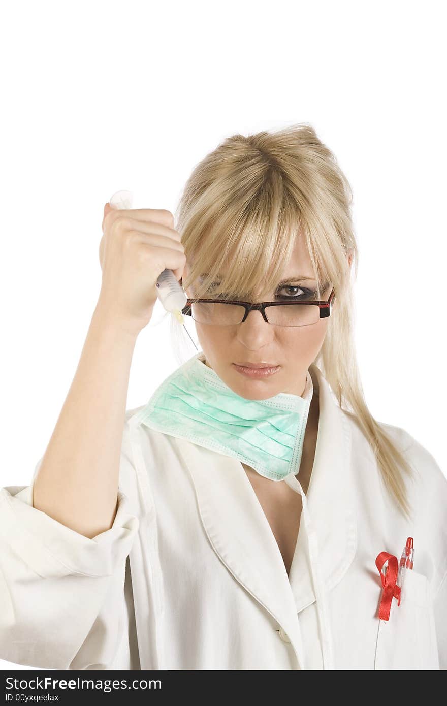 Female blond nurse holding syringe isolated on white background. Female blond nurse holding syringe isolated on white background