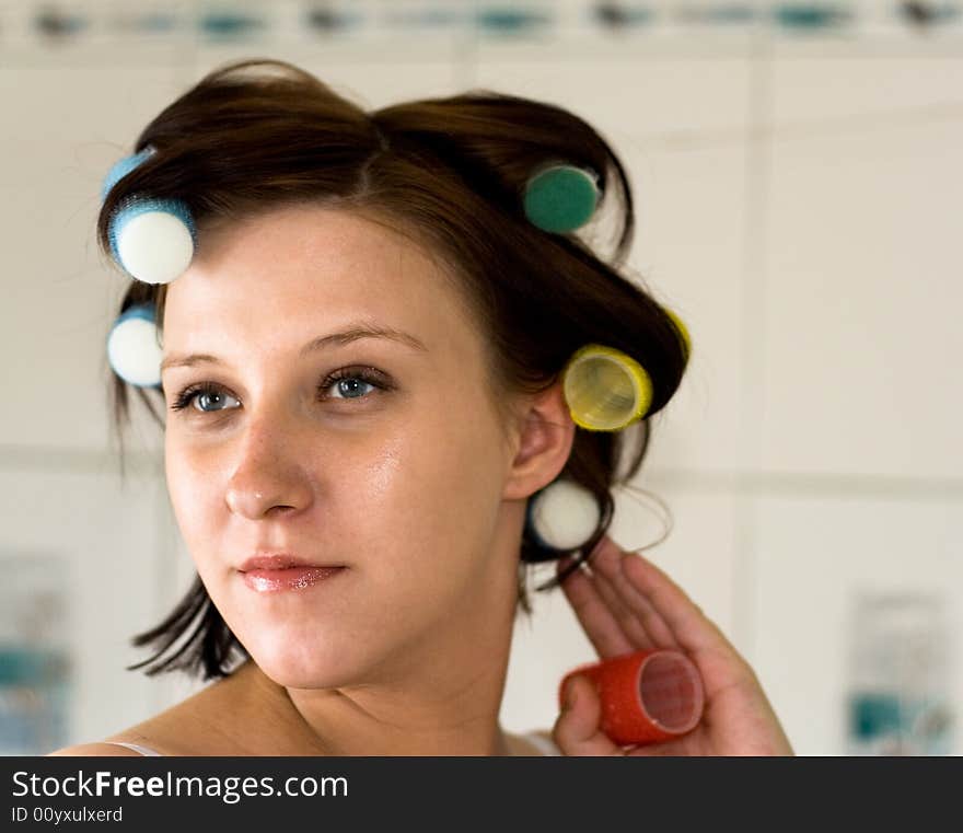 Woman with rollers on head