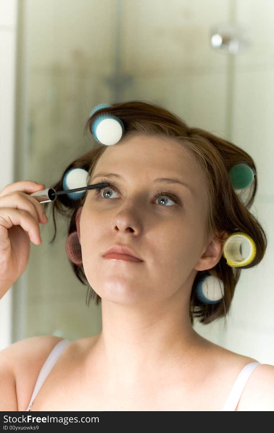 Make-up in bathroom in the mirror