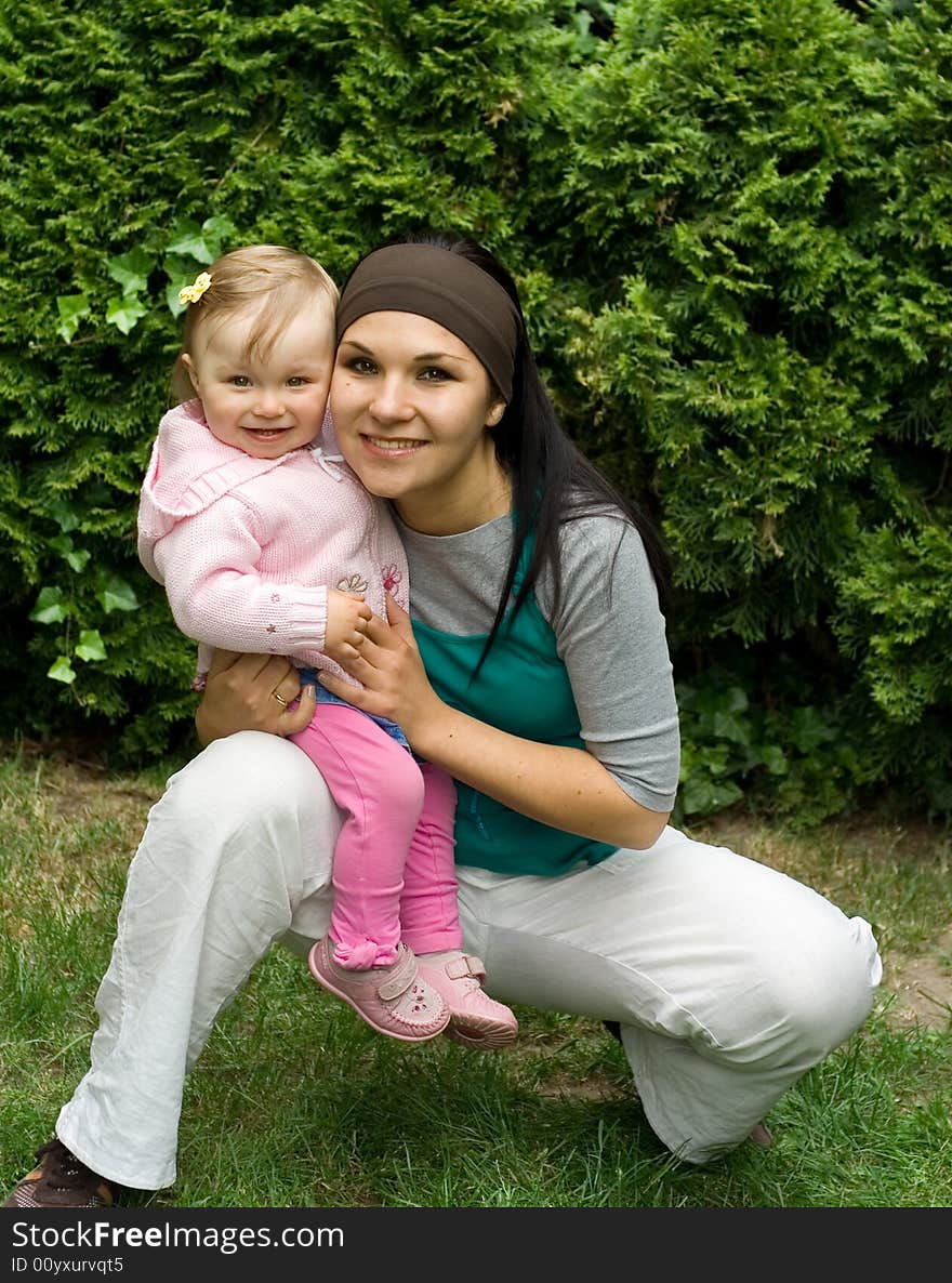 Happy mother with daughter outdoor. Happy mother with daughter outdoor