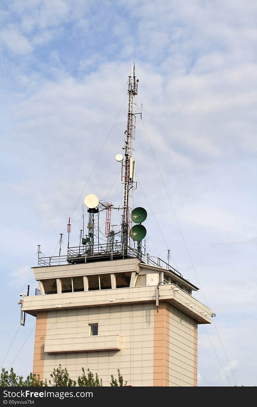 The tower in the airport with telecom equipment. The tower in the airport with telecom equipment