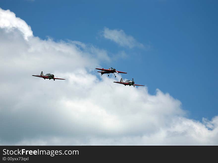 Air show in blue sky.