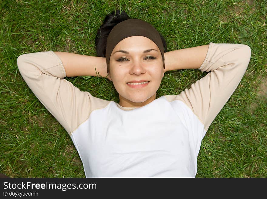 Attractive woman on green grass. Attractive woman on green grass