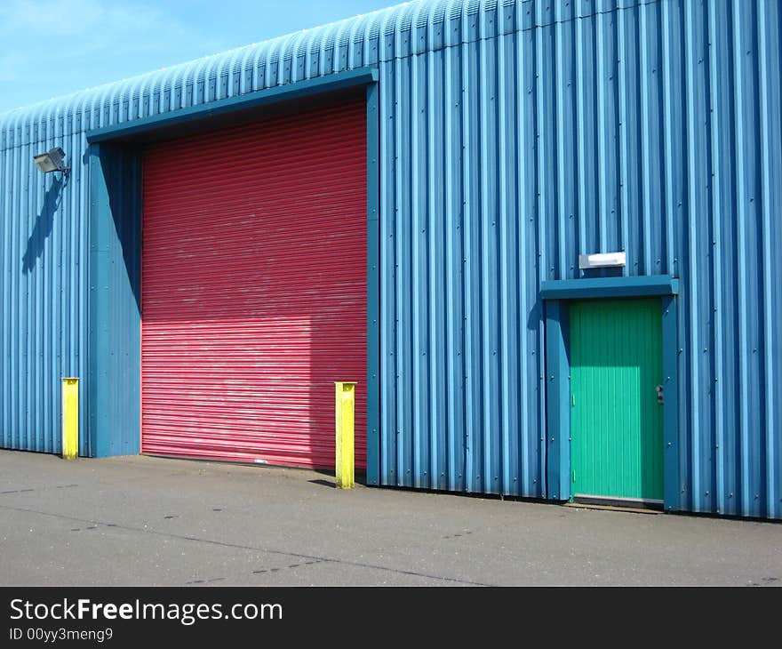 Factory With Colourful Doors And Posts