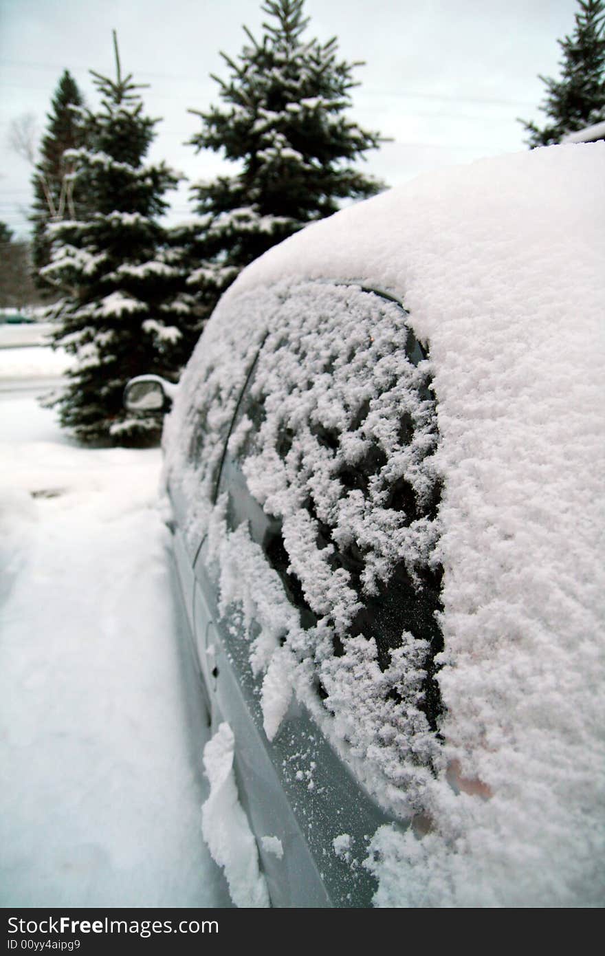 Car covered in snow in a bitter winter. Car covered in snow in a bitter winter