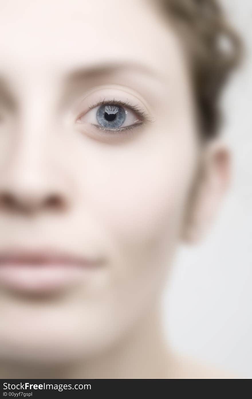 Portrait of a young woman with blue eyes