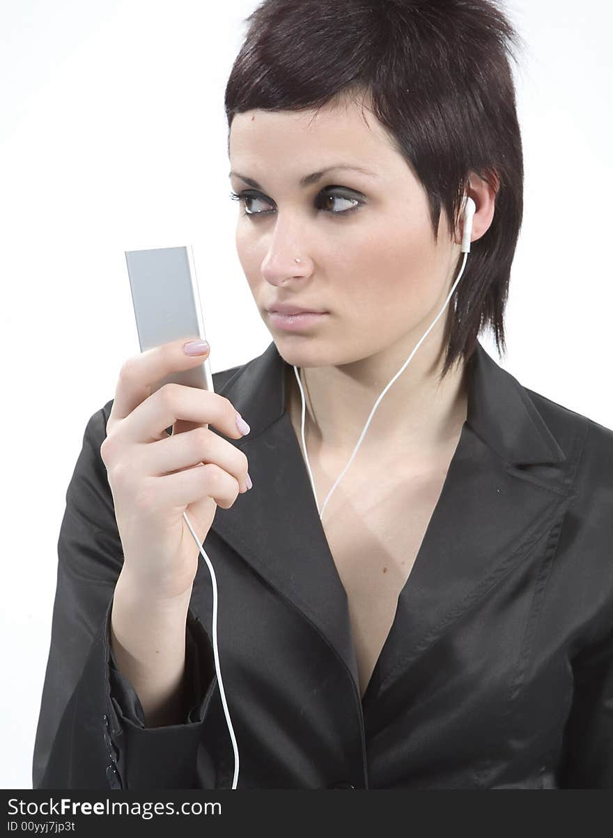 Girl with Mp3-player listening to the music