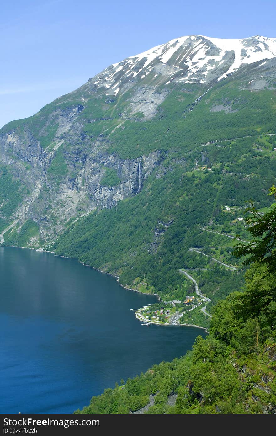 Ocean fjord in Norway, flying seagulls, green mountains. Ocean fjord in Norway, flying seagulls, green mountains