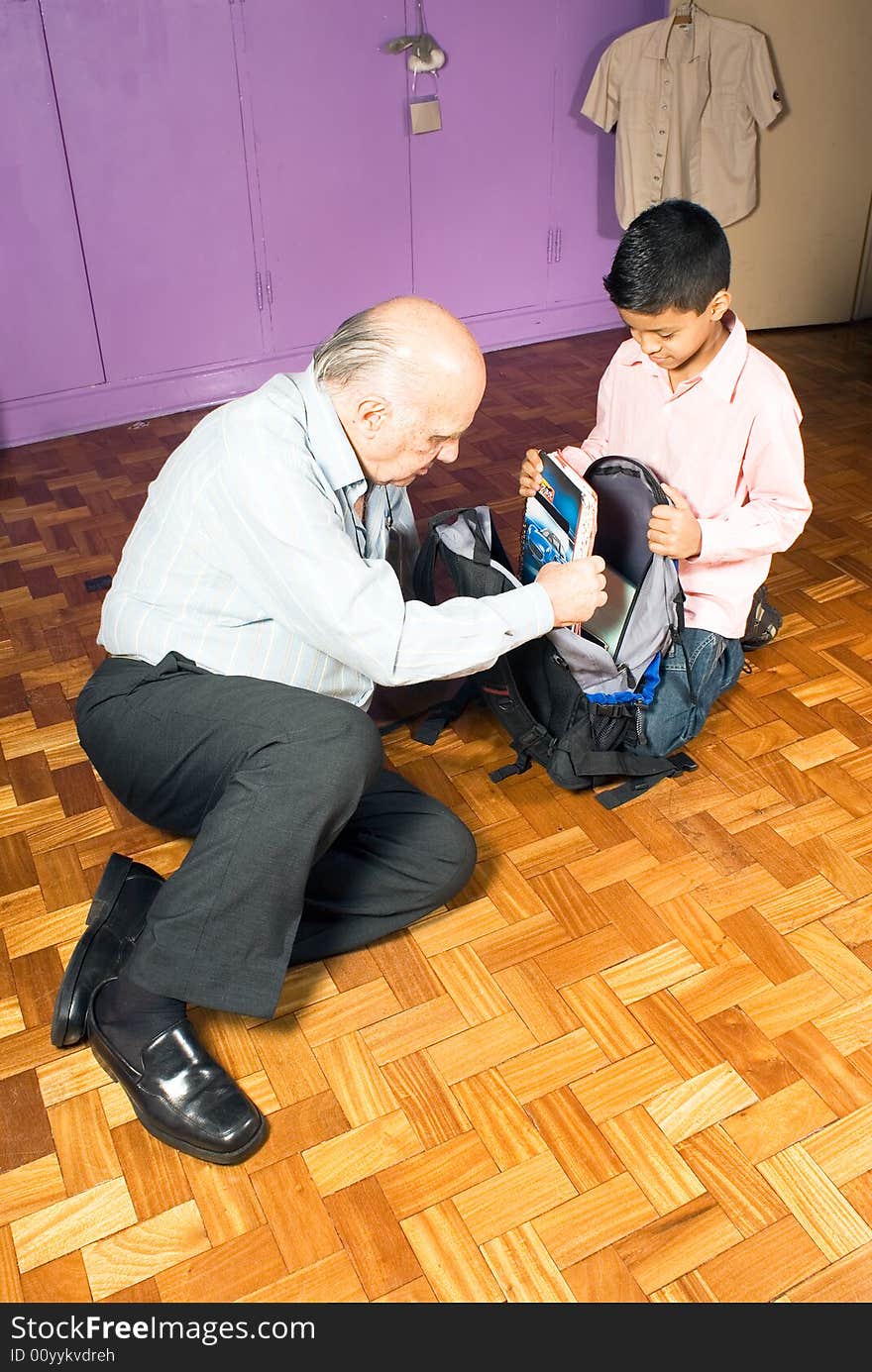 Grandfather And Grandson On The Floor - Vertical