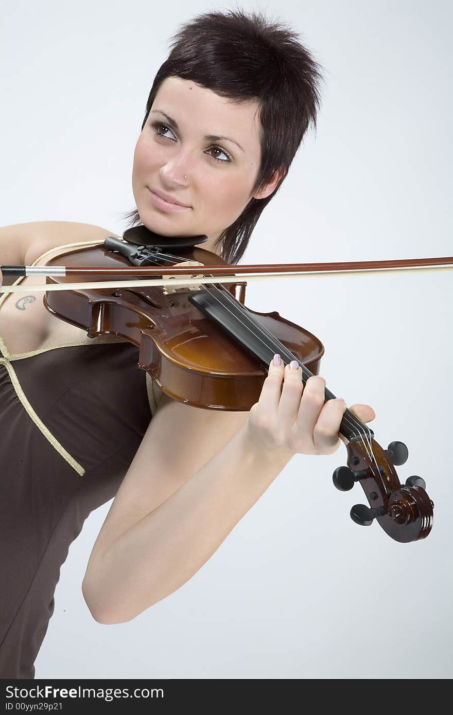 Pretty girl with violin isolated on white. Pretty girl with violin isolated on white