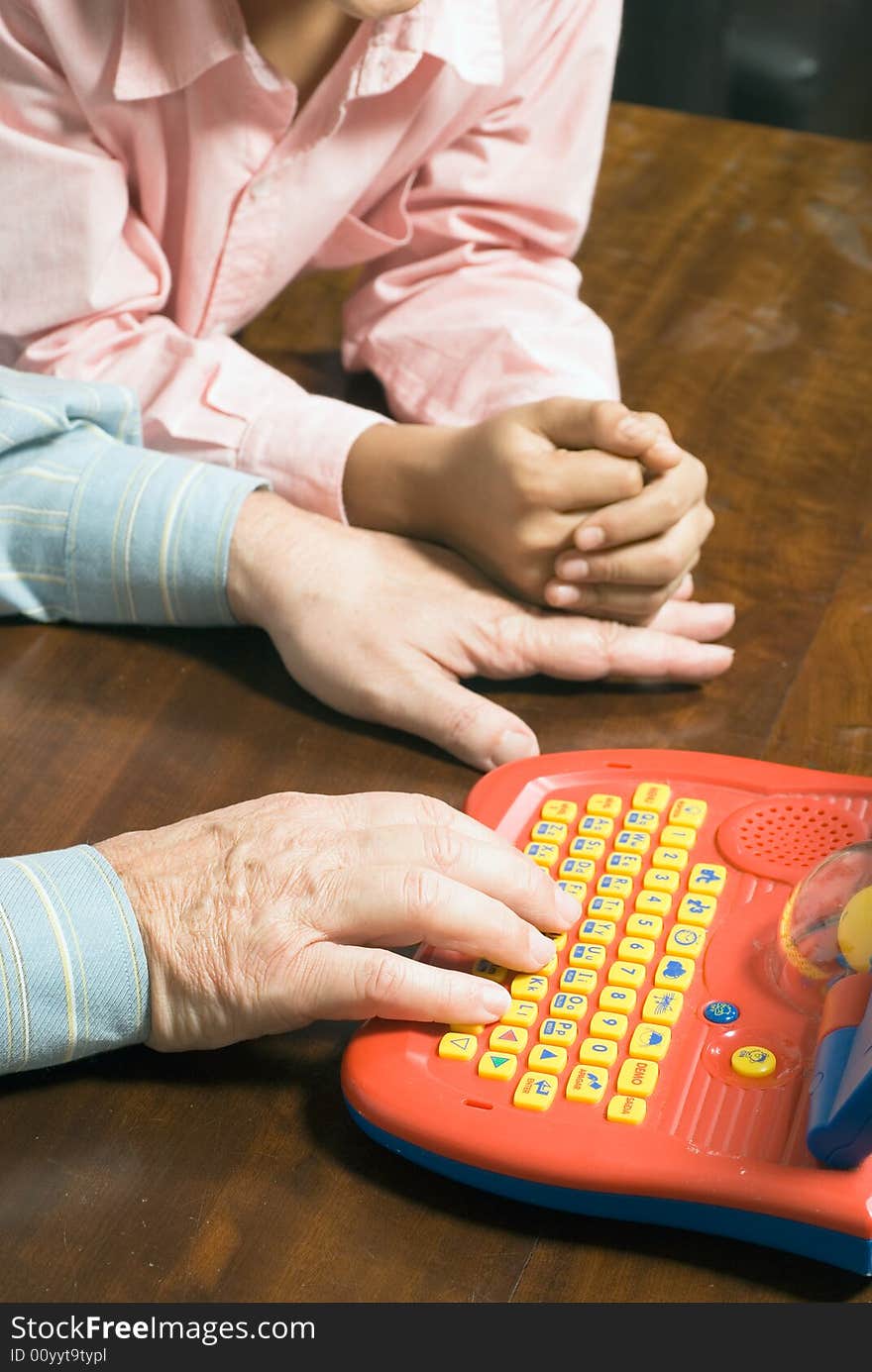 Grandfather and grandson sitting at the table - Ve