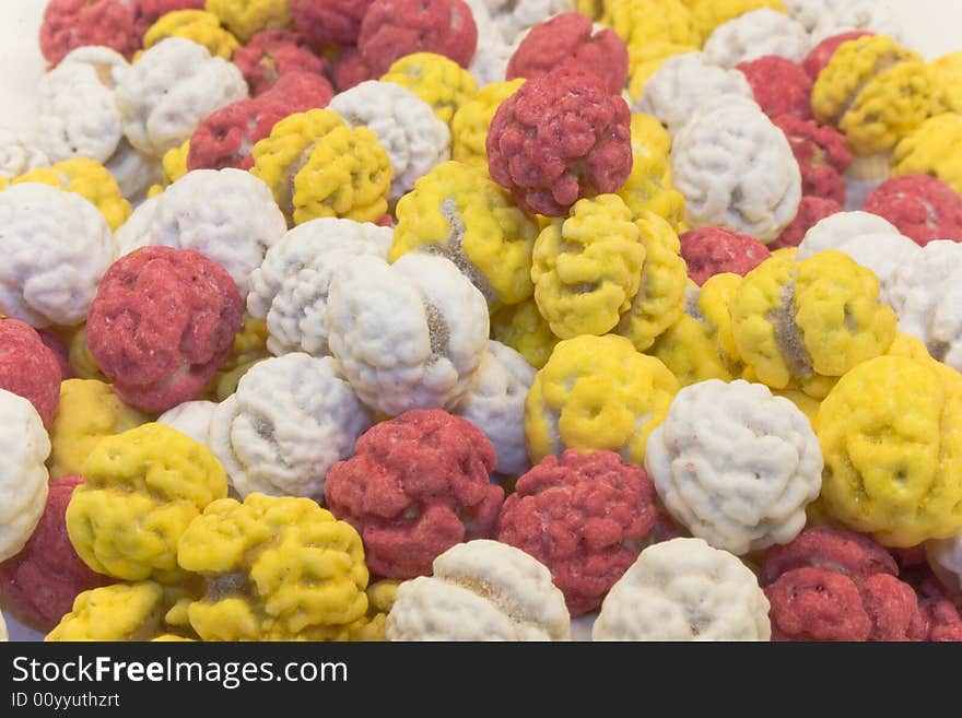 Lots of  sugar chickpeas in various colors background. Lots of  sugar chickpeas in various colors background