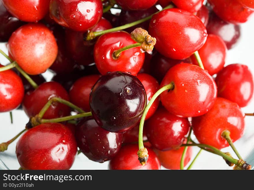 A background of red cherries. A background of red cherries