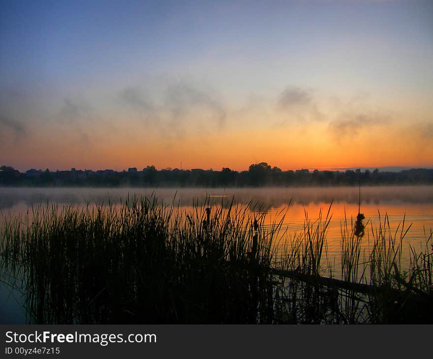 Colourful dawn ashore wonderful quiet lake. Colourful dawn ashore wonderful quiet lake