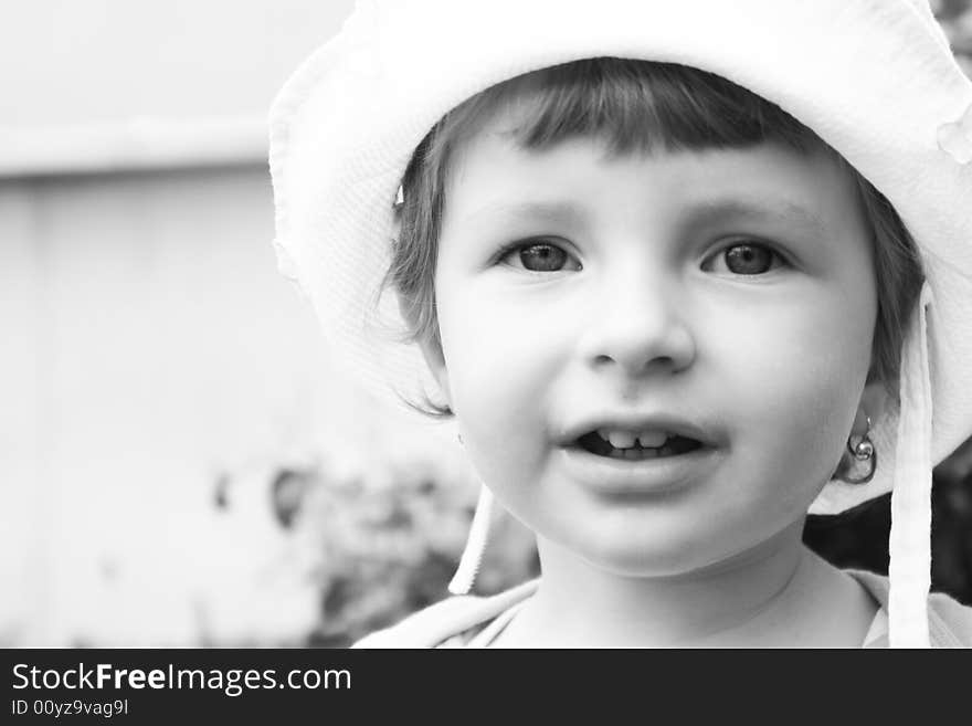 Black and white portrait of a beautiful little girl