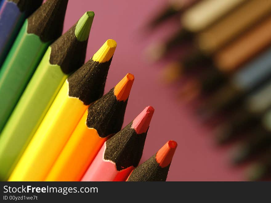 A part of  pencils with a simple  colorful background. A part of  pencils with a simple  colorful background