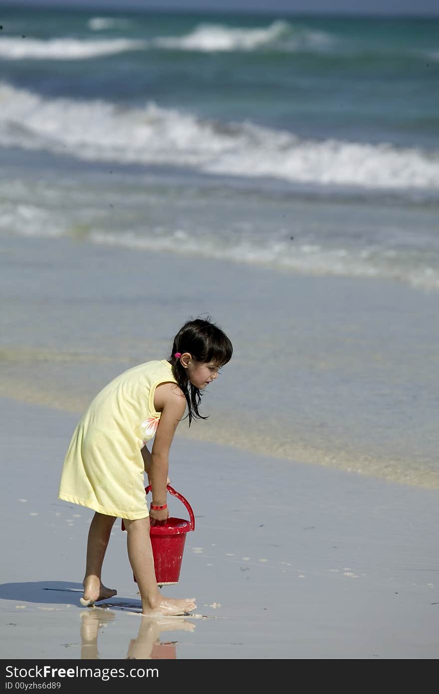 Little child play with sand