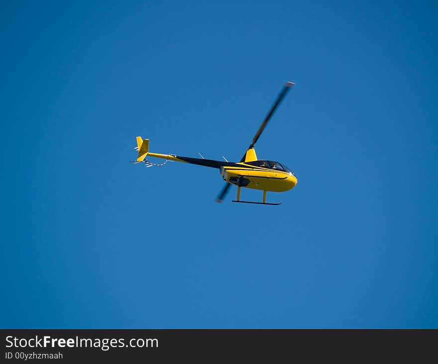 Small private Helicopter in Sky