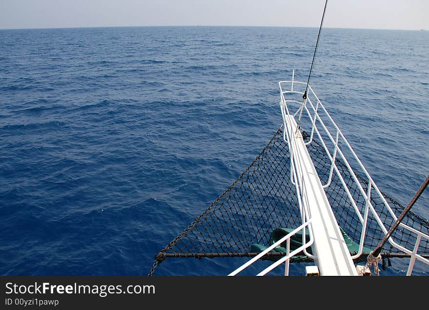 White nose of the ship on a background of the sea