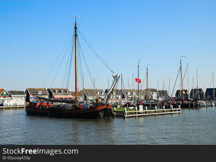 Old dutch houses and boats in Marken a small village near Amsterdam. Old dutch houses and boats in Marken a small village near Amsterdam