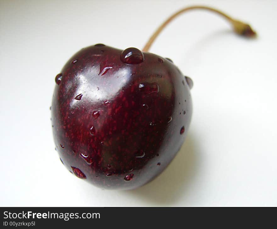 Sweet cherry close up on a gray-white background