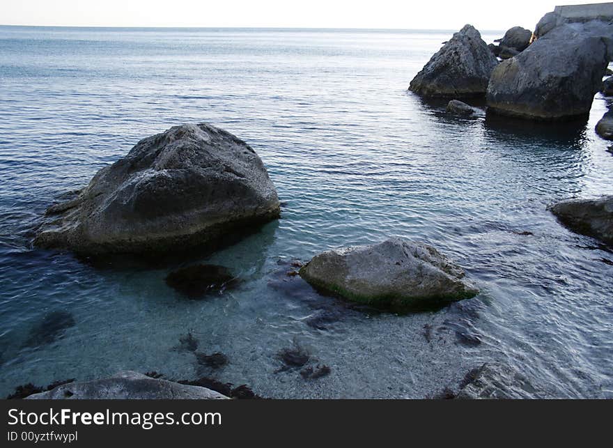 Stone in water ashore epidemic deathes daytime. Stone in water ashore epidemic deathes daytime