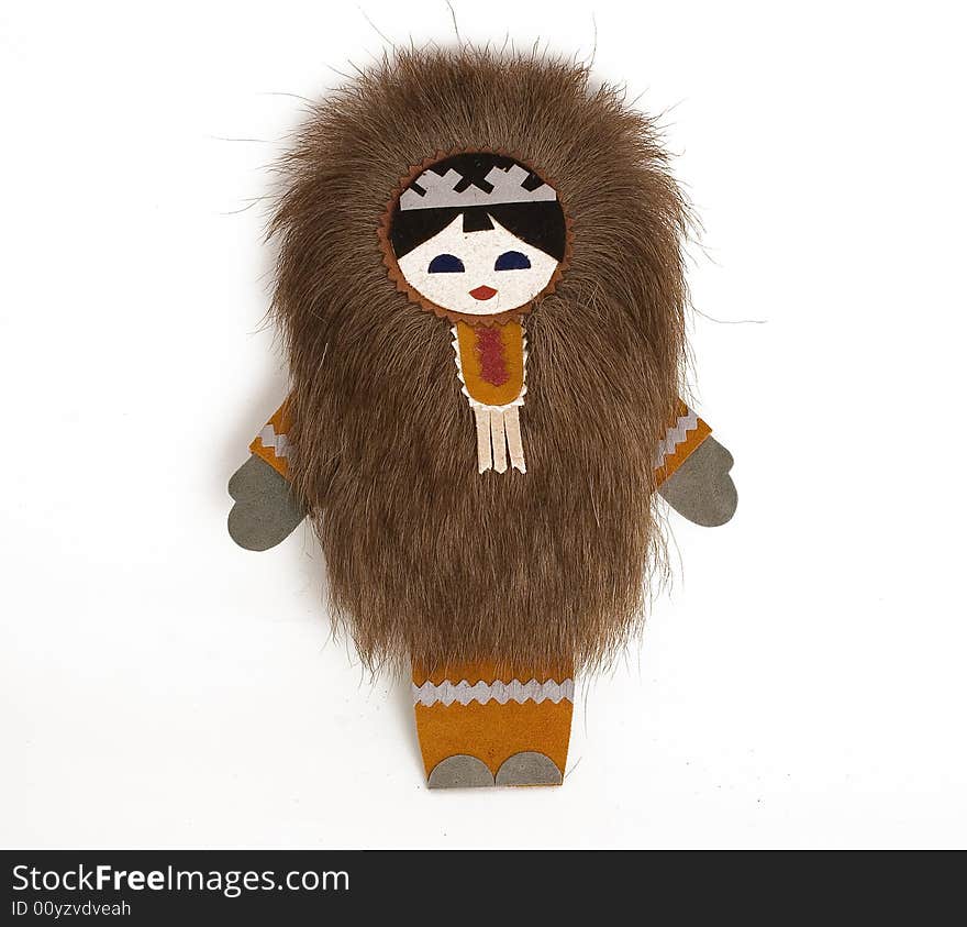 Ethnic doll in the order from a skin of a reindeer