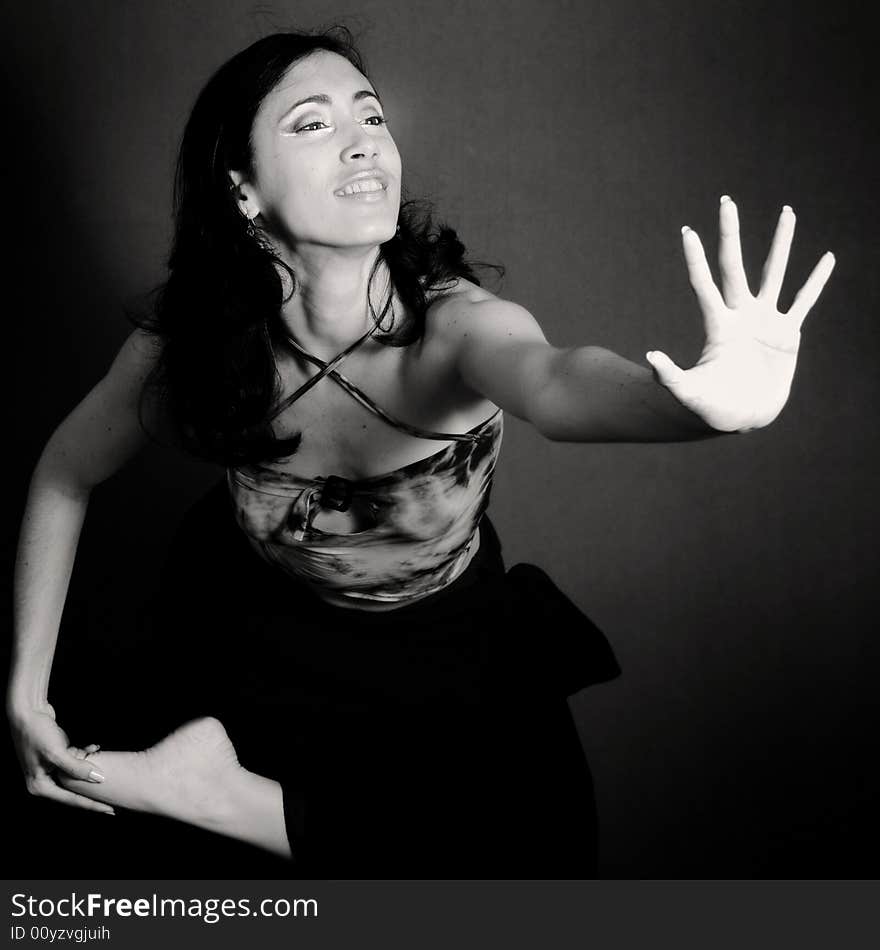 Female contemporary dancer doing gesture with a hand