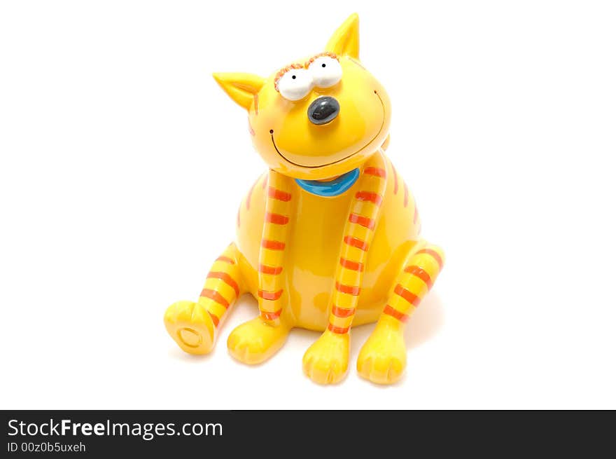 Toy yellow cat ovet white