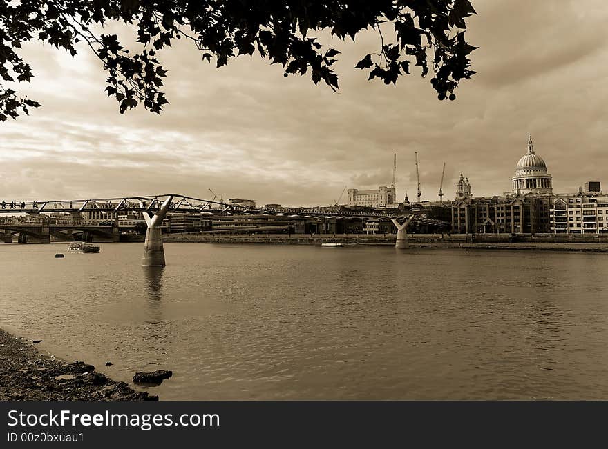 A view of the Thames and St Paul in London. Sepia. A view of the Thames and St Paul in London. Sepia