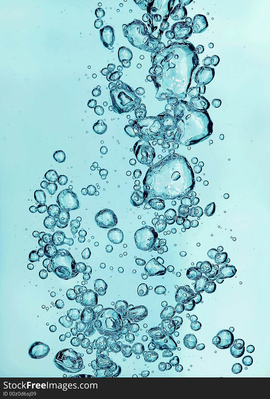 Water blast with bubbles in oceanic color