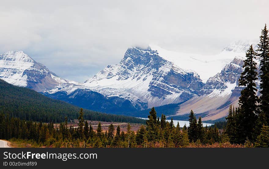 Glacier lake in the mountains in the late fall