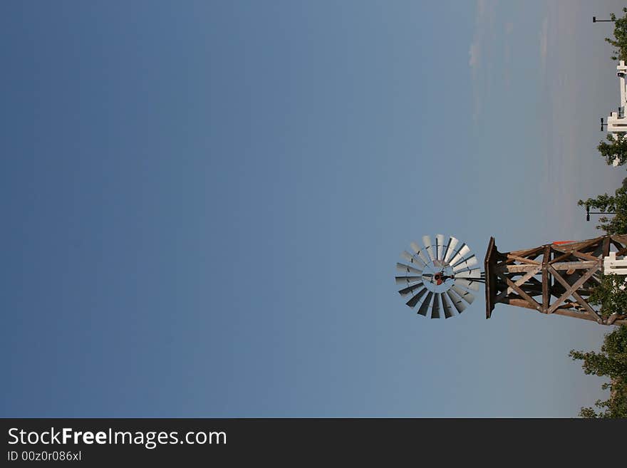 A windmill on a hot summer day. A windmill on a hot summer day