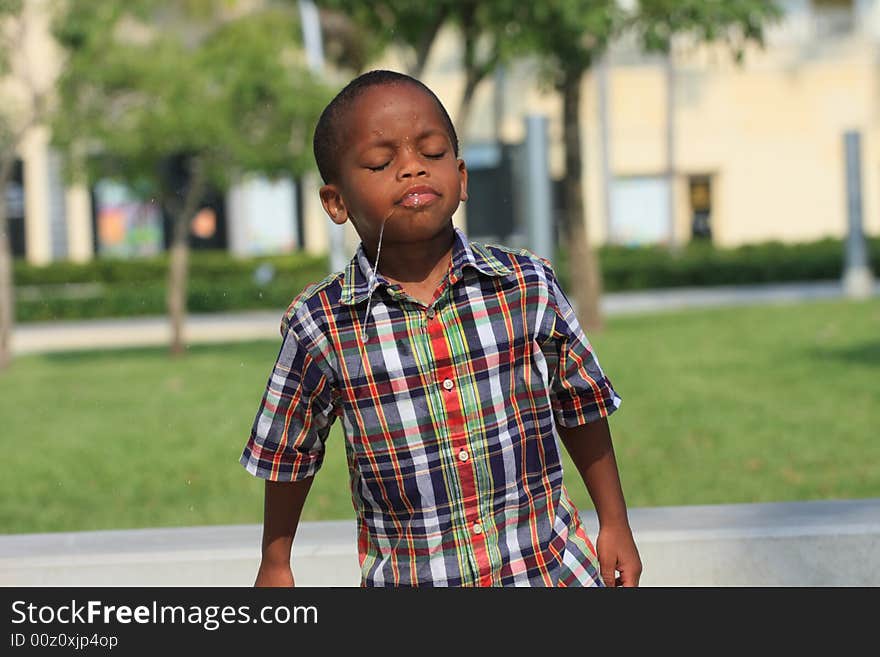 Young boy with drool coming out of his mouth. Young boy with drool coming out of his mouth.