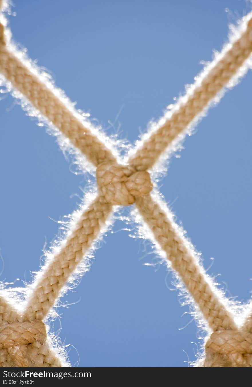 Weaves From A Basketball Hoop Net