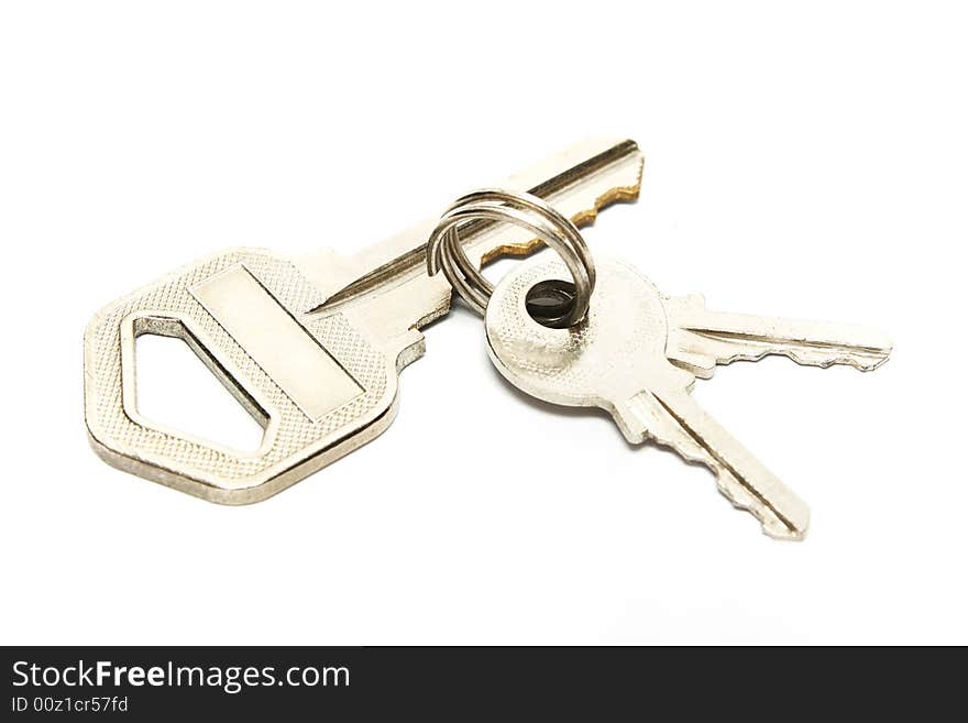 Big versus small keys on white background.