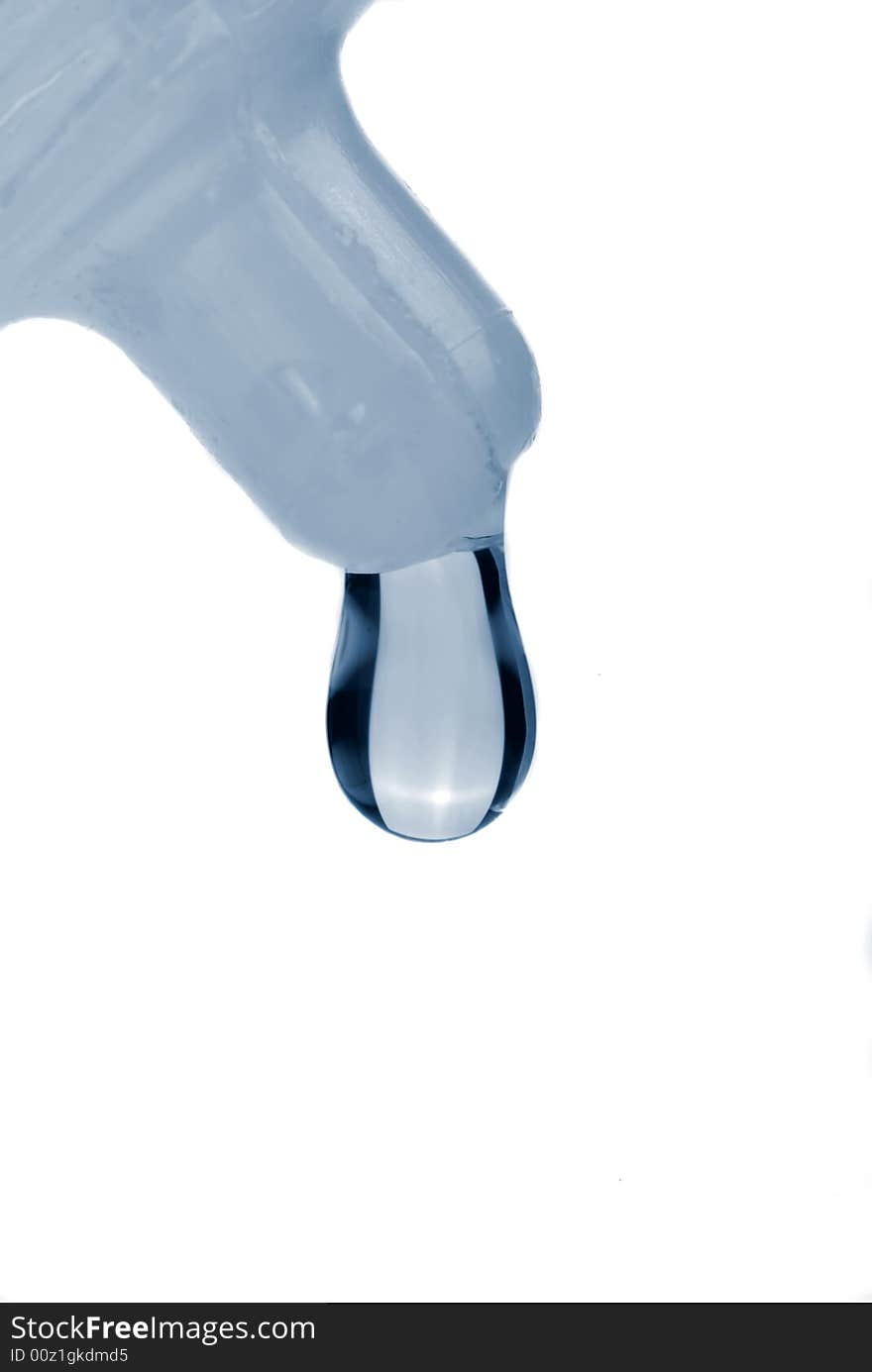 Drop of water falls from a tube, isolated over white