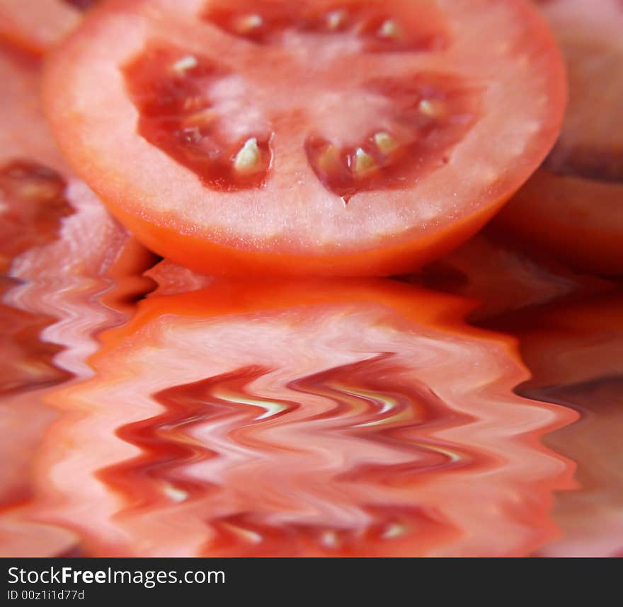 A close up view of slices of roma tomatoes