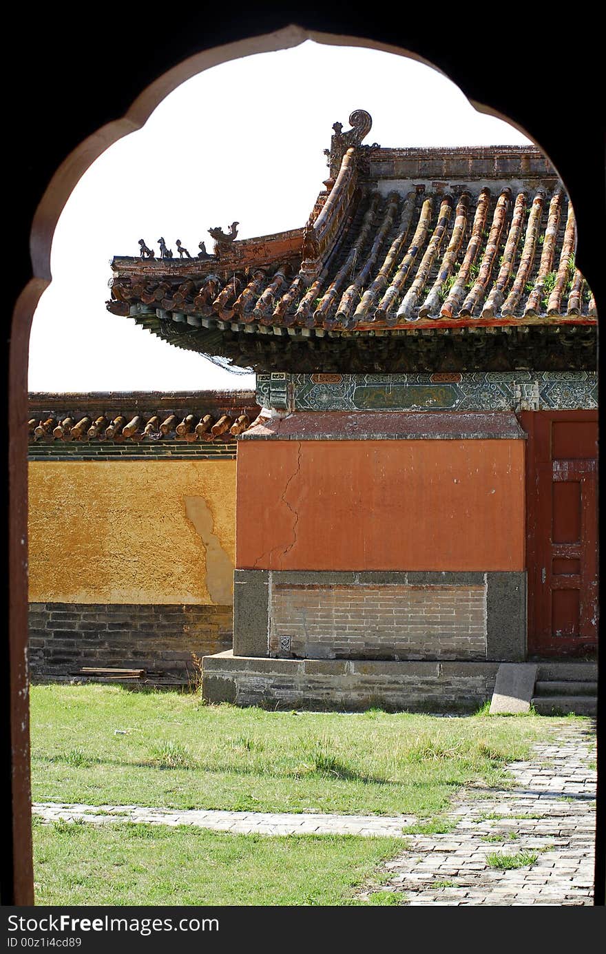 A view through an open door of a temple inside the grounds of Amarbayasgalant Monastery, one of a handful of Buddhist sites still remaining in Mongolia