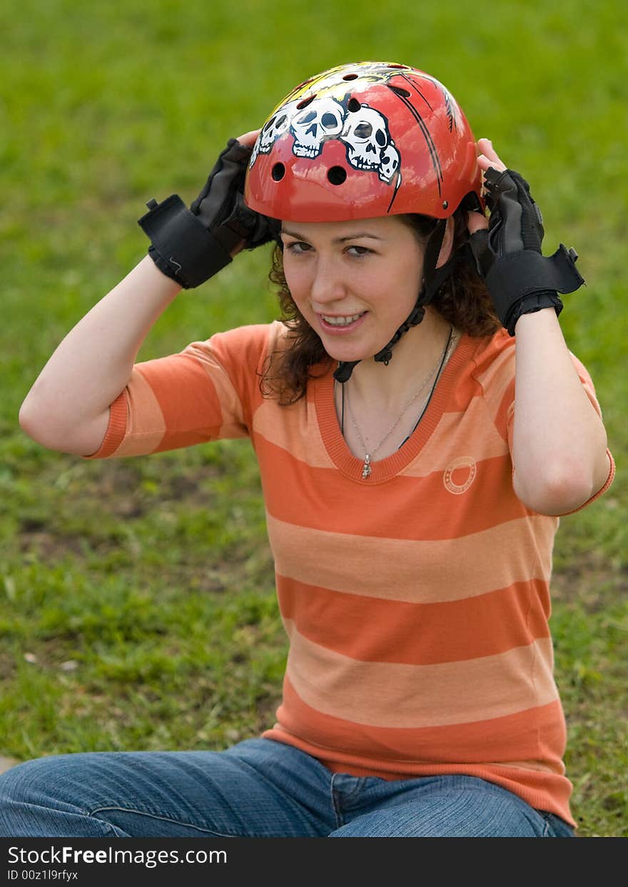 Smiling Sports Girl Outdoors on Green Background