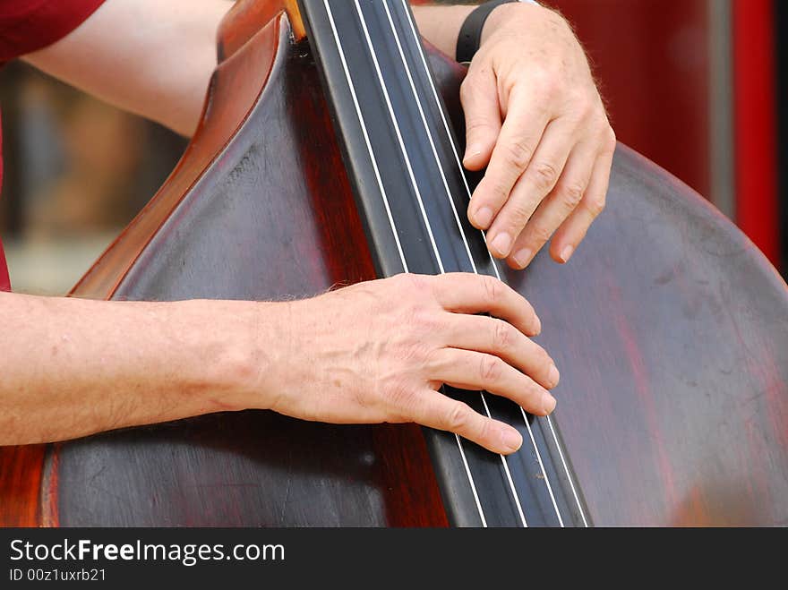 Musician hands on an against a low