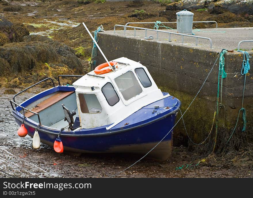 Boat At Low Tide