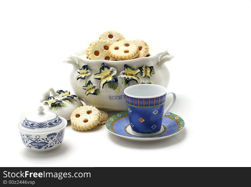 Cookie Jar With Sugar Bin And Blue Cup isolated on white backround.