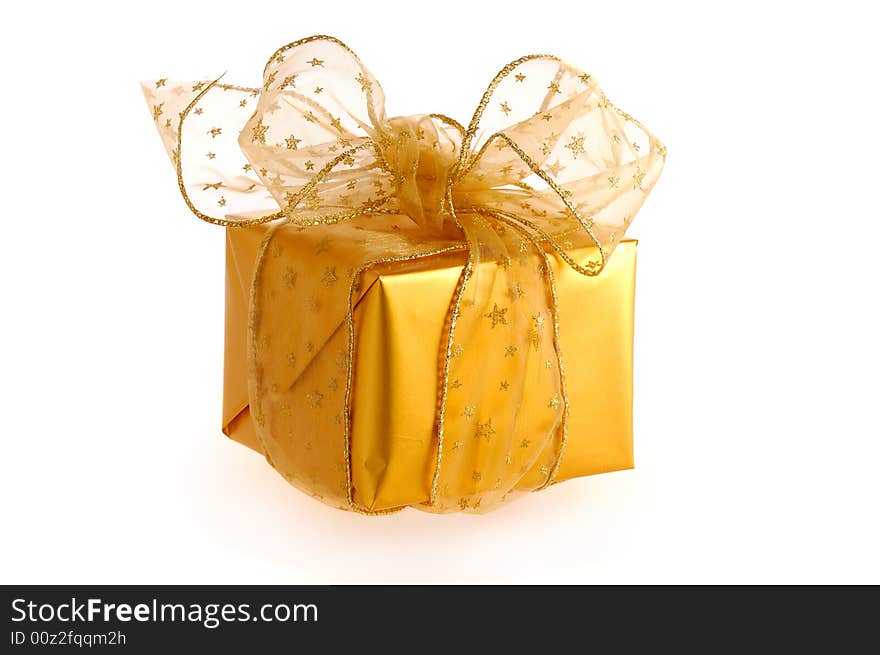 Golden box with golden ribbon