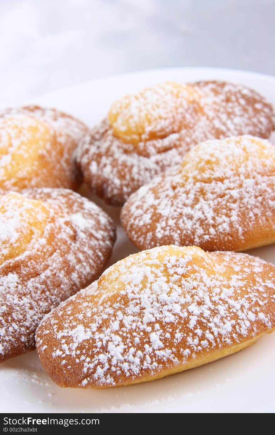 Doughnuts With Stuffing And Powdered Sugar