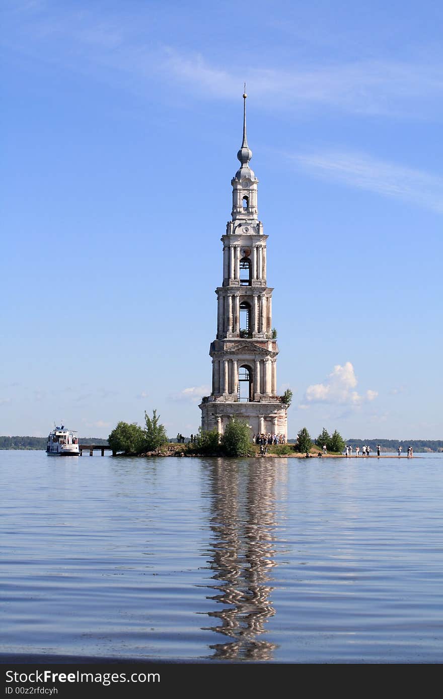 The bell tower among water in summer. The bell tower among water in summer